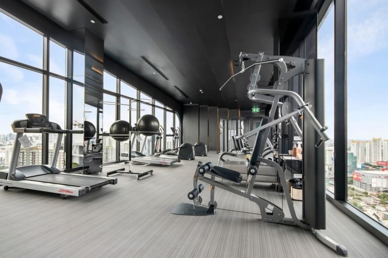 A gym room in a high-rise building.
