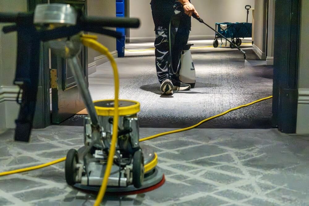 Man Cleaning Carpet