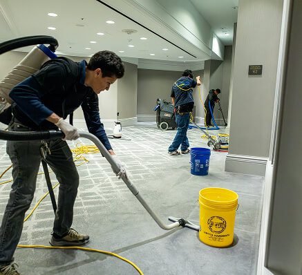 man doing steam cleaning